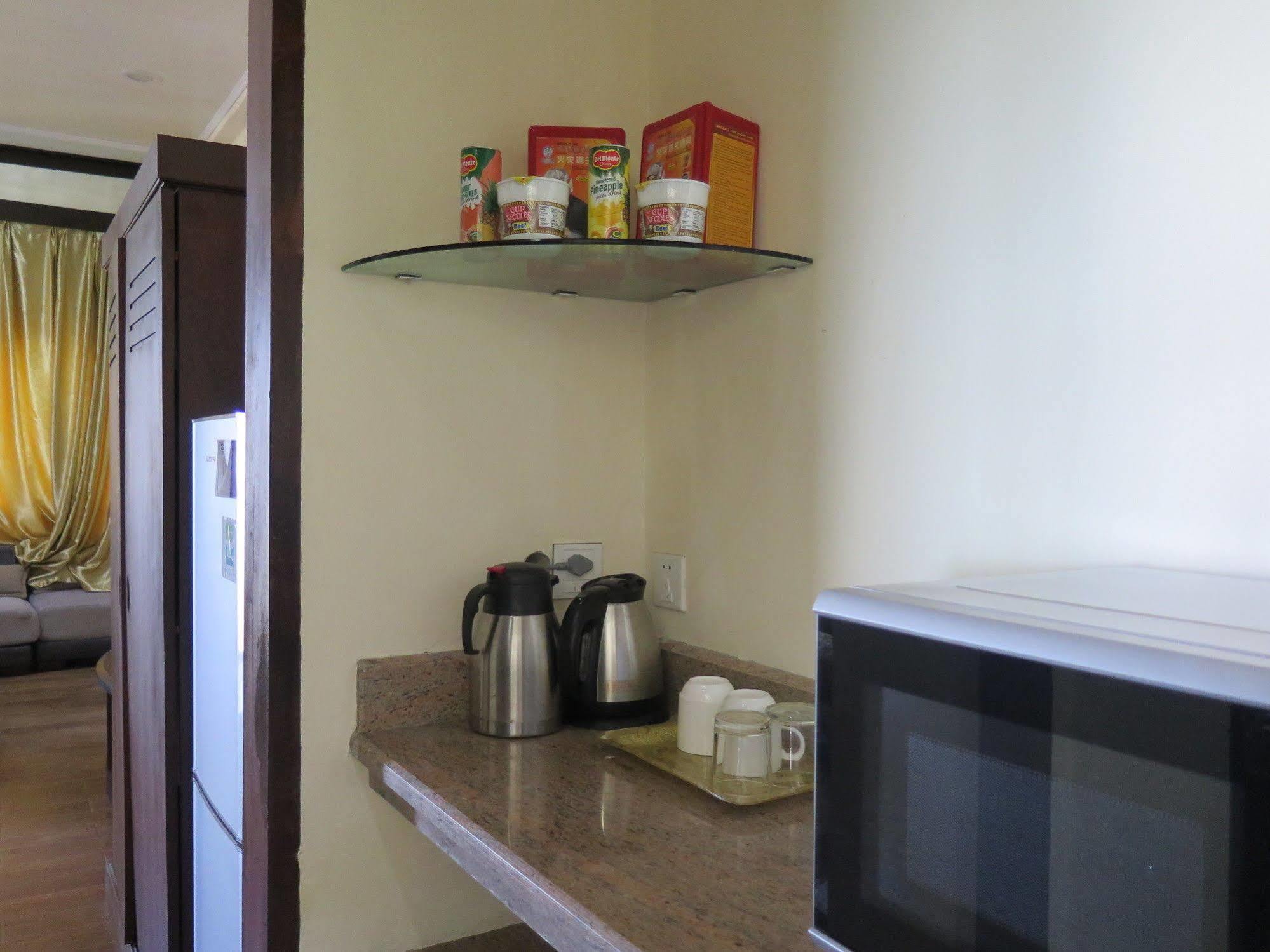Hotel Essencia Dumaguete City Экстерьер фото